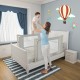Toddler bed rail guard with adjustable height and double safety lock, ensuring safety and convenience for various.