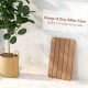 Brown waterproof HIPS spa shower mat with slatted design, anti-slip foot pads, ideal for quick drying in bathrooms.