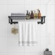 Wall mounted towel shelf in black with adjustable towel bar, featuring storage for towels and toiletries, ideal for.