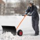29-inch snow pusher with ergonomic handle, large wheels, and adjustable height for efficient driveway snow removal.