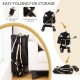 3-in-1 pet stroller in black, showcasing easy folding for storage beside a sofa, perfect for pet transport and.