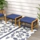 Navy cushion ottomans with acacia wood frames and PE rattan, ideal for outdoor seating or footrests.