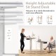 Height adjustable electric standing desk in gray, with USB charging port, ranges from 28.5" to 45.5" for versatile use.