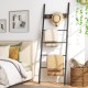 Wall-leaning decorative blanket holder with 5 removable hooks, featuring a durable metal frame, ideal for home.