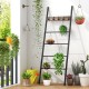 Wall-leaning blanket ladder with 5 removable hooks, featuring a durable metal frame, ideal for home decor and storage.