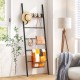 Wall-leaning decorative blanket holder with 5 removable hooks, featuring a durable metal frame for stylish storage.