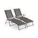Two coffee-colored folding chaise lounge chairs with adjustable backrests, perfect for backyard or poolside relaxation.