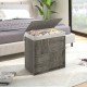 Gray laundry hamper with a removable liner bag and foot pads, designed for easy movement and classification of clothes.