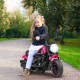 Kids electric motorcycle in pink with training wheels, LED headlights, and anti-slip handlebars for safe riding fun.