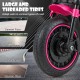 Large threaded tires of the pink kids electric motorcycle, suitable for various road types like cement and brick.