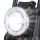 Close-up of the bright LED headlight on a pink kids electric motorcycle, featuring training wheels for safe riding.