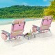 Two pink reclining beach chairs with a folding side table, perfect for outdoor relaxation by the water.