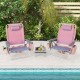 Two pink reclining beach chairs with a folding side table, perfect for outdoor relaxation by the pool.