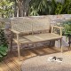 Teak wood garden bench with natural rattan backrest, designed for two, ideal for patio or garden relaxation.