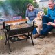 Barbecue charcoal grill with wind guard, 280 sq.in. cooking area, and seasoning racks, perfect for outdoor grilling.