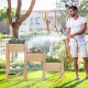 3-tier wooden raised garden bed made of natural fir wood, ideal for growing flowers and herbs in your garden.