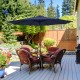 Dark blue 9-foot patio umbrella with solar LED lights, crank lift, and tilt adjustment, perfect for outdoor relaxation.