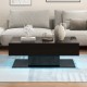 Modern LED coffee table in black with 20 color lights, two storage drawers, and a sleek high-gloss surface for living.
