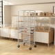 20-tier bun pan speed rack with lockable rubber wheels, designed for easy movement in kitchens and bakeries.
