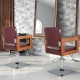 Hydraulic barber chair with red PVC leather and wooden accents, featuring 360-degree swivel and adjustable height for.