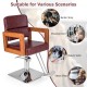 Hydraulic barber chair with red PVC leather, 360-degree swivel, and adjustable height for salon use.