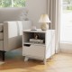 Mid Century Modern bedside table in white with storage drawer and open shelf, ideal for bedroom essentials.