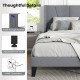 Full/Queen size bed frame with wingback headboard, side storage pockets, and adjustable foot pads for stability.