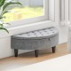 Half-moon storage bench in gray velvet with nailhead trim and rubber wood legs, perfect for stylish storage in any room.