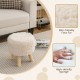 Round faux fur footstool with rubber wood legs, featuring a padded seat for comfort, perfect for living room use.