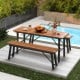 Rectangular folding picnic bench set made of acacia wood, perfect for outdoor dining and gatherings by the pool.
