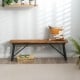 Rectangular acacia wood folding picnic bench with sturdy metal legs, perfect for indoor and outdoor seating.