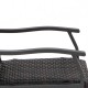Curved armrests of the brown wicker swing glider from the 4-piece patio set, designed for outdoor relaxation.