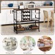 3-tier bar cart on wheels in rustic brown with wine glass racks, bottle holders, and storage boxes for versatile use.