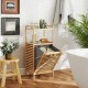 Bamboo tilt-out laundry hamper with removable basket and two shelves, perfect for bathroom or laundry room organization.