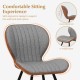 Curved backrest and U-shaped seat of a gray armless dining chair, designed for comfort and elegance in any space.
