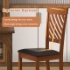 Ergonomic dining chair with walnut finish, curved backrest, and rubber wood legs for comfort and elegance in dining.
