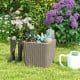 Outdoor resin storage side table with wicker-woven accent, featuring a removable lid, ideal for patio and garden use.
