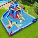 Rocket theme inflatable water slide park with splash pool and multiple slides for kids' summer fun in the yard.