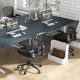 Adjustable swivel mesh task office chair with flip-up armrests in black, designed for comfort and ergonomic support.