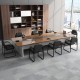 Black reception chairs with sled base and padded armrests, ideal for office or waiting room use, showcasing ergonomic.