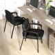 Black waiting room chairs with ergonomic backrest and padded armrests, perfect for office or conference room use.