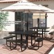 Square black picnic table with benches for 8 people, featuring an umbrella hole, ideal for outdoor patio use.
