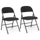 Black folding chairs with metal frame and PVC leather, featuring curved backrest and soft padding for comfort.