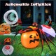 Inflatable spider on a pumpkin with colorful rotating light, perfect for Halloween backyard decoration.