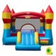 Brightly colored indoor outdoor blow-up bouncy castle with slide and basketball hoop, made from durable 420D oxford cloth.