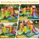 Colorful inflatable bounce castle with double slides, climbing wall, and ocean ball pool for outdoor fun and play.