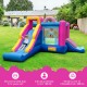 Inflatable bounce house with dual slides, featuring a colorful doughnut theme and mesh safety walls for secure play.