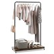 Rolling garment rack with hanging hooks, bottom storage shelf, and stylish clothing display for organized living spaces.