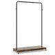 Rolling garment rack with heavy-duty hooks and a wide storage shelf, perfect for organizing clothes and accessories.