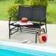 Black iron patio rocking chair for two, perfect for outdoor relaxation by the poolside with comfortable seating.